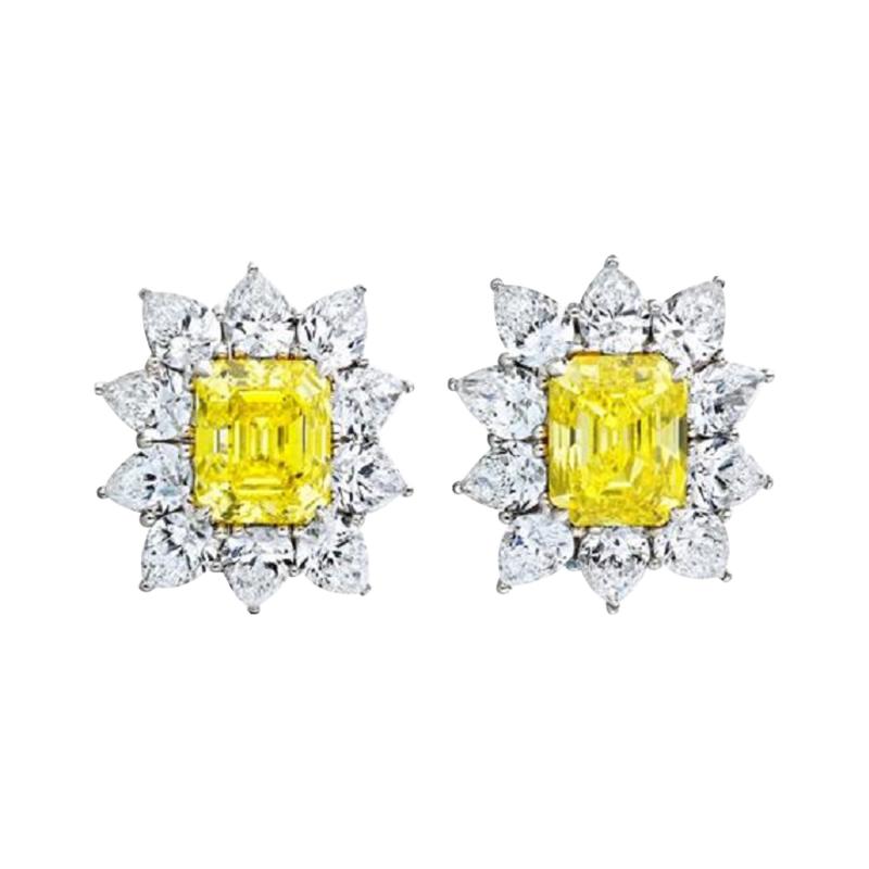 16 66 CARATS FANCY VIVID YELLOW EMERALD CUT HALO DIAMOND EARRINGS