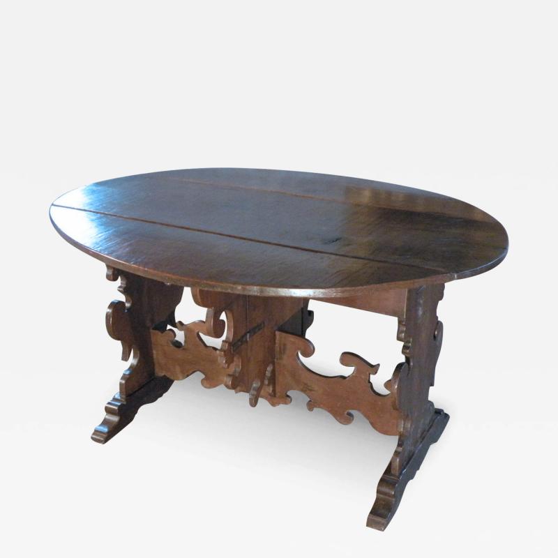 17th Century Italian Baroque Walnut Oval Drop Leaf Table
