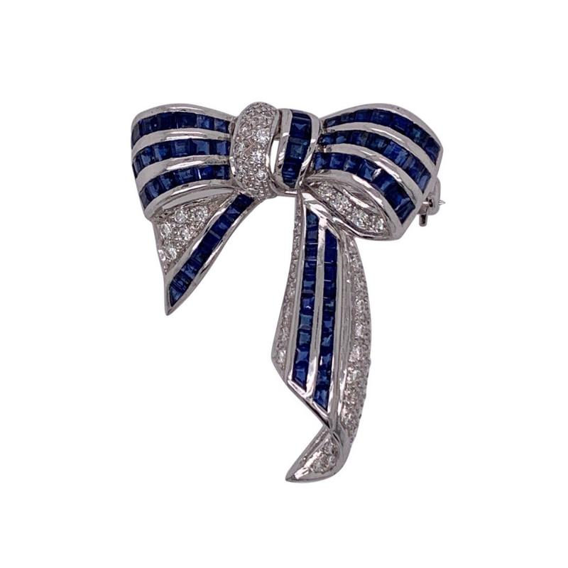 18 Karat White Gold Sapphire and Diamond Bow Pin 1 10 TDW
