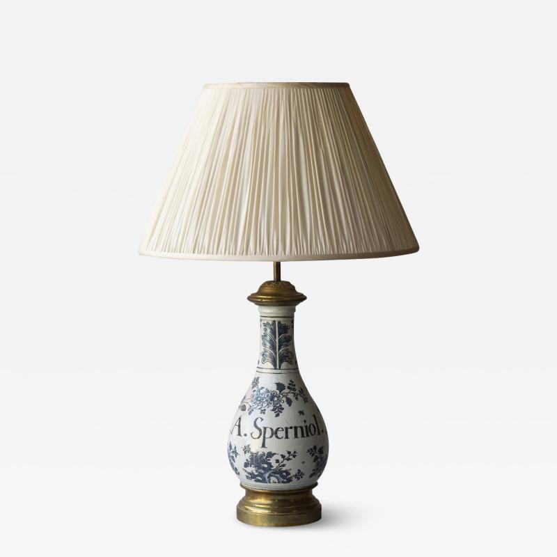 18TH CENTURY FA ENCE BOTTLE CONVERTED TO A TABLE LAMP