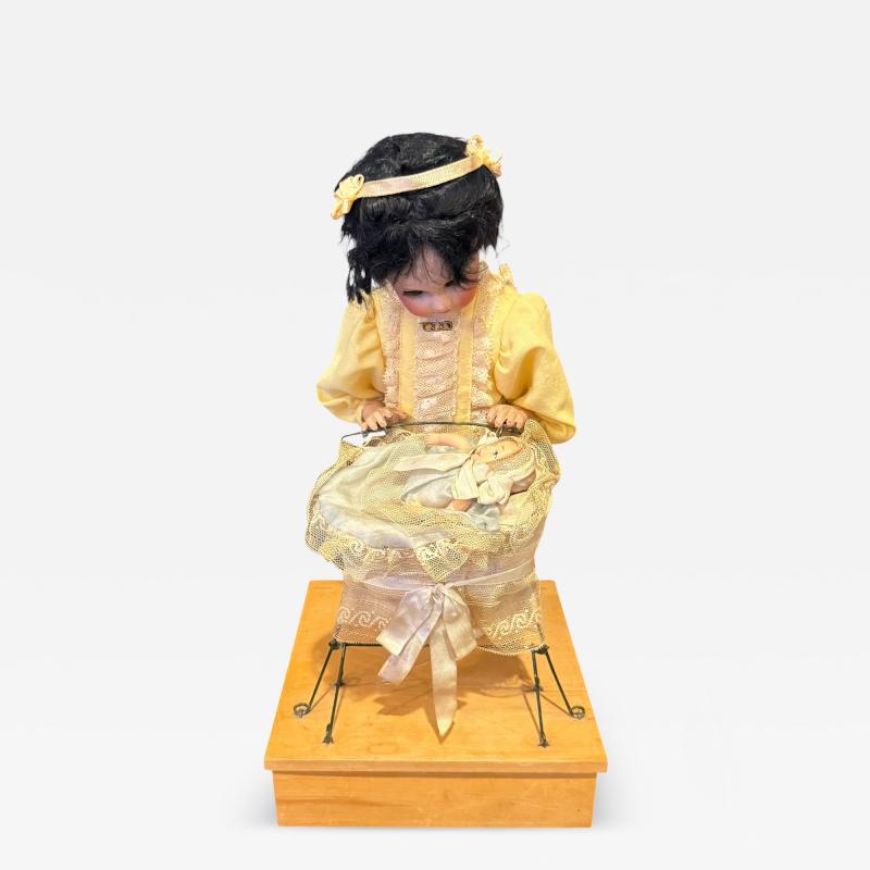 1900s FRENCH BISQUE MOTHER DOLL ROCKING BABY IN BASSINET MUSICAL AUTOMATON