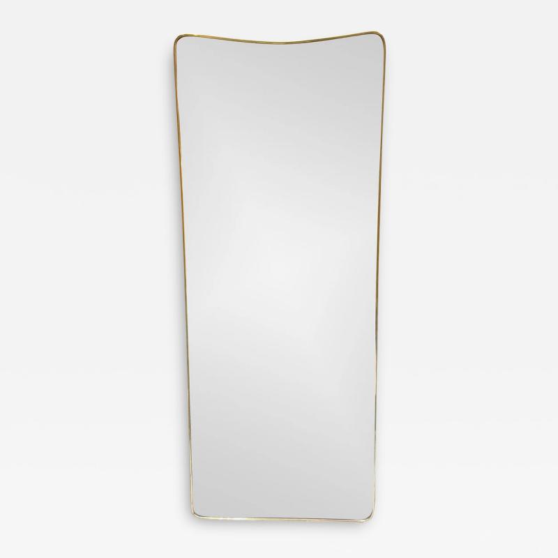 1950S LONG SLIGHT CURVED MIRROR IN AGED BRASS IN THE STYLE OF GIO PONTI