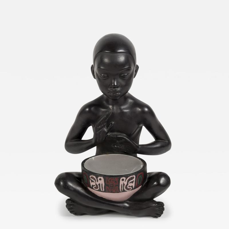 1950s Ceramic lamp showing a little African playing Tom tom signed A Carli