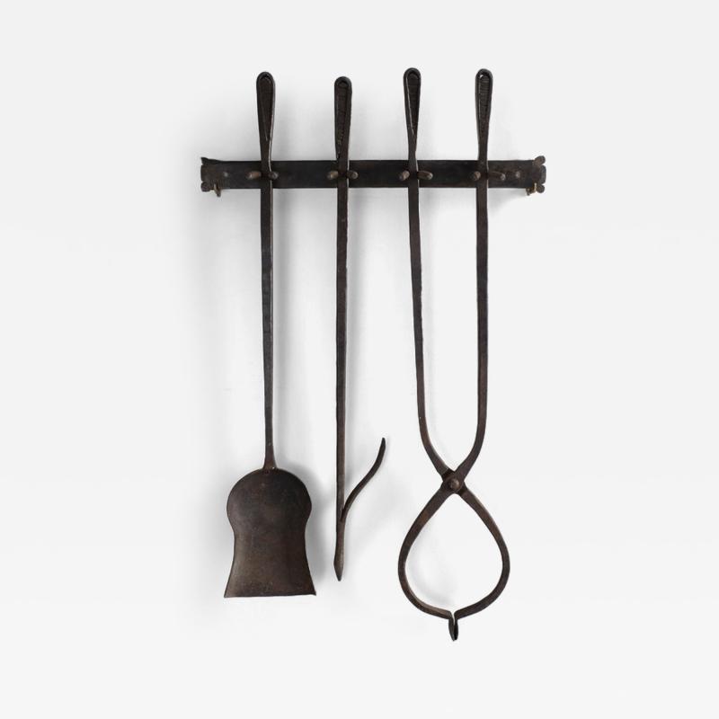 1970s wrought iron wall hung fire tols