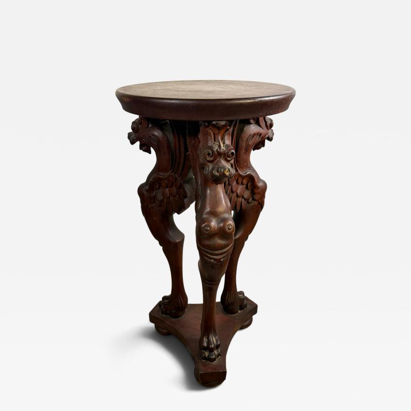 19TH CENTURY GOTHIC WINGED LIONESS CARVED MAHOGANY TABLE WITH CLAW FEET