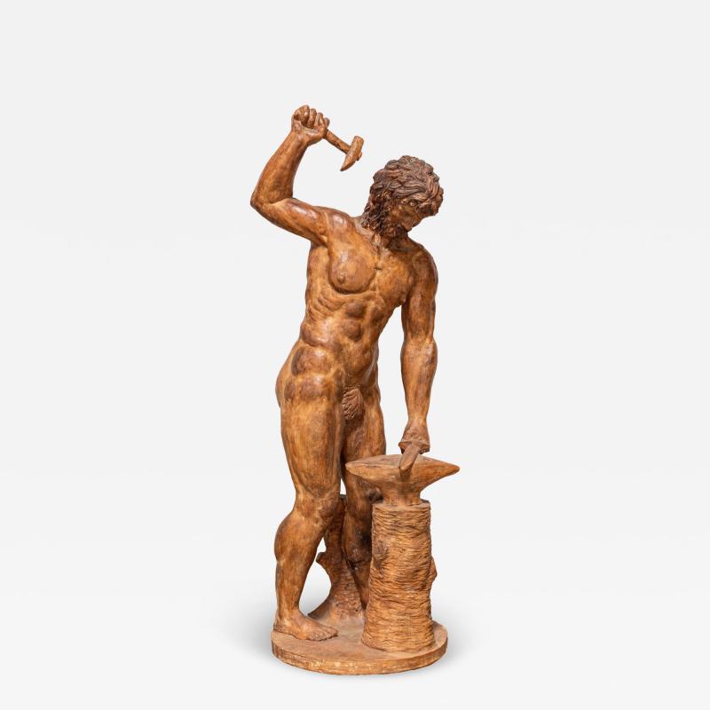 19th Century Italian Terracotta Statuette of Vulcan Forging a Dagger on an Anvil