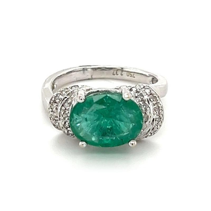 2 37 Carat Oval Cut Emerald in Retro Curved White Gold 4 Prong Ring