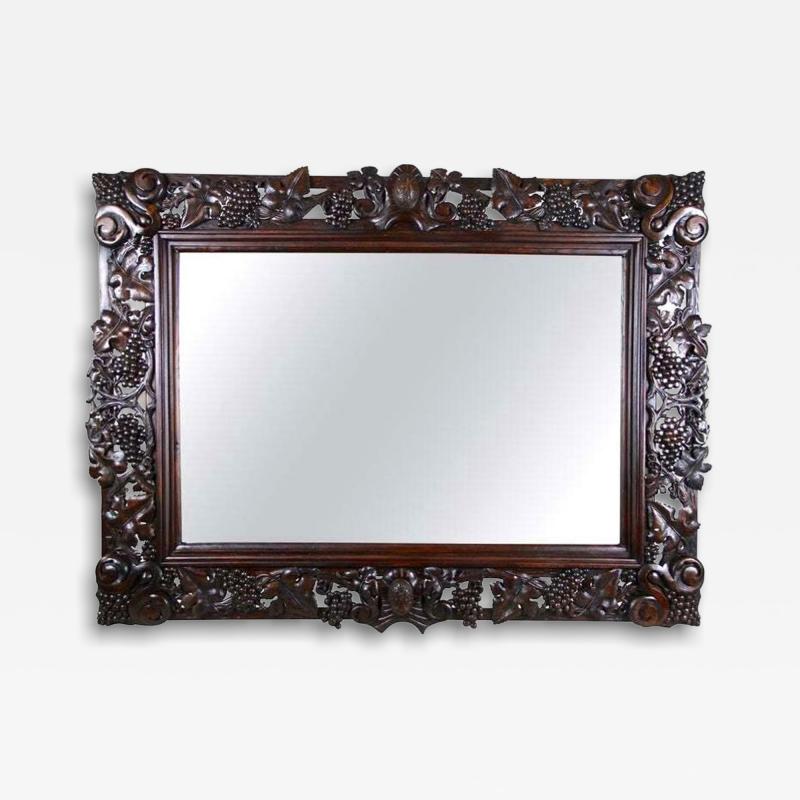 20th Century Black Forest Wall Mirror with Grapes and Leaves Hand Carved 1919