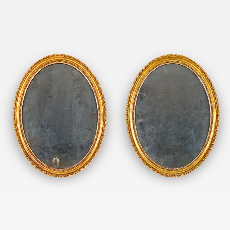 2697 Pair of 18th Century English Oval Gilt Mirrors
