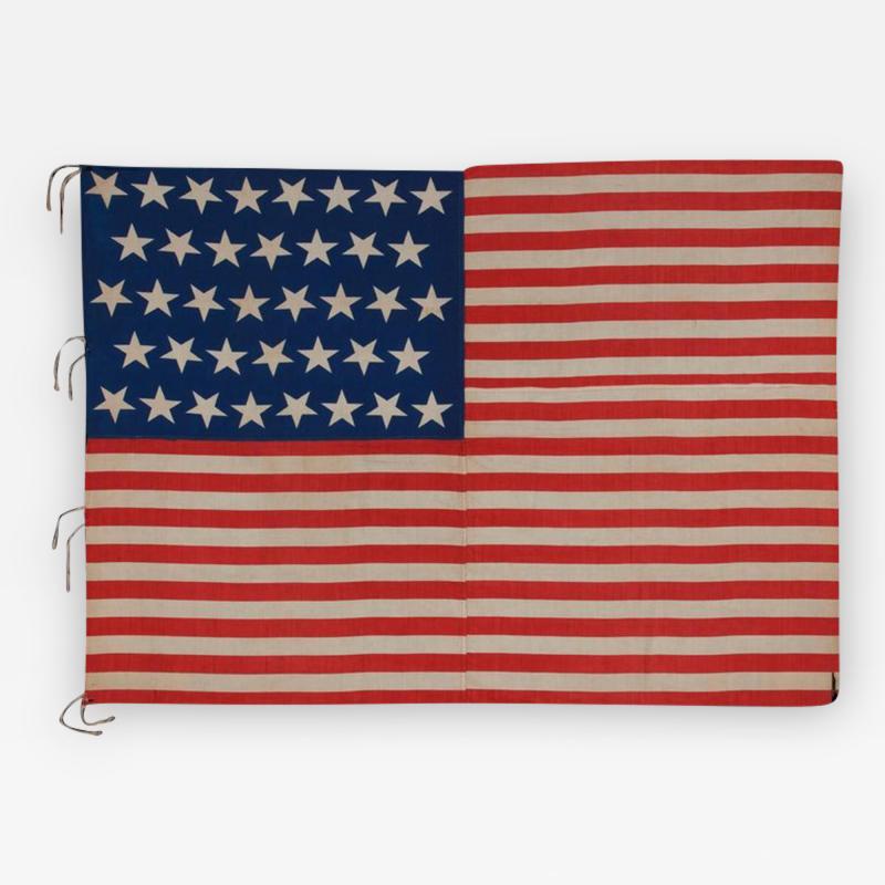38 Stars and a Very Unusual Complement of 31 Stripes on an Antique American Flag