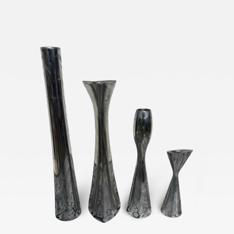 4 Various Size and shaped Nambe Polished Aluminum Candleholders