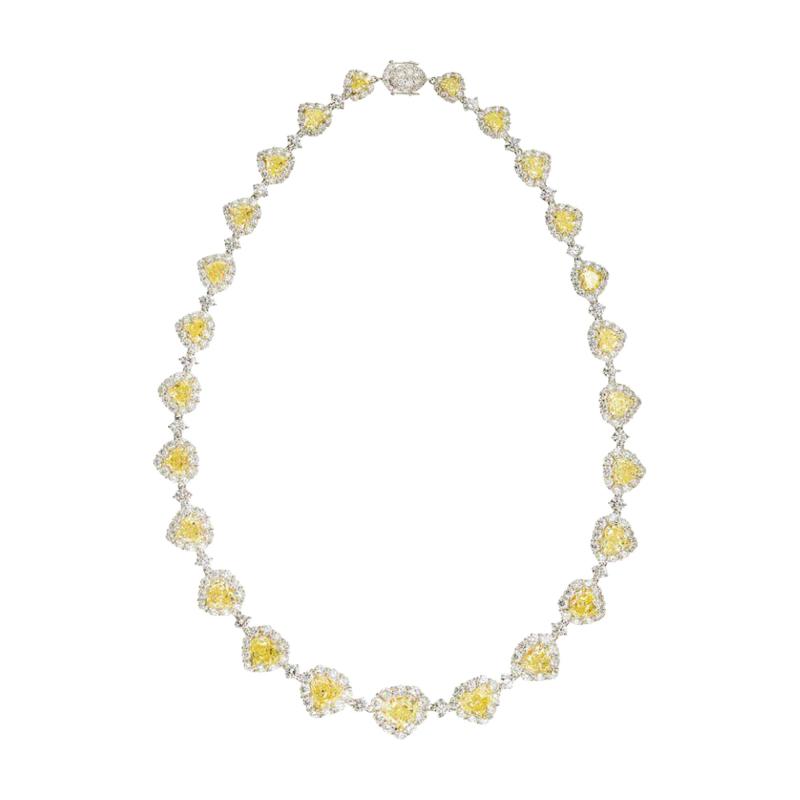 50 CARAT FANCY INTENSE YELLOW HEART AND WHITE DIAMOND INFINITY NECKLACE