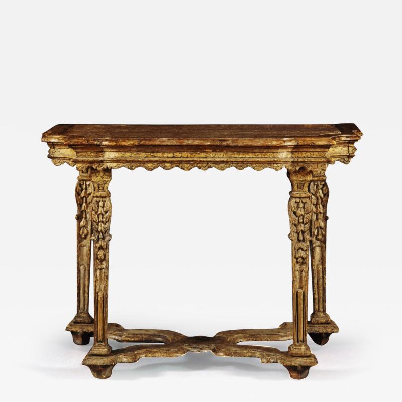 9079 A LATE BAROQUE CARVED AND MARBLEIZED SIDE TABLE