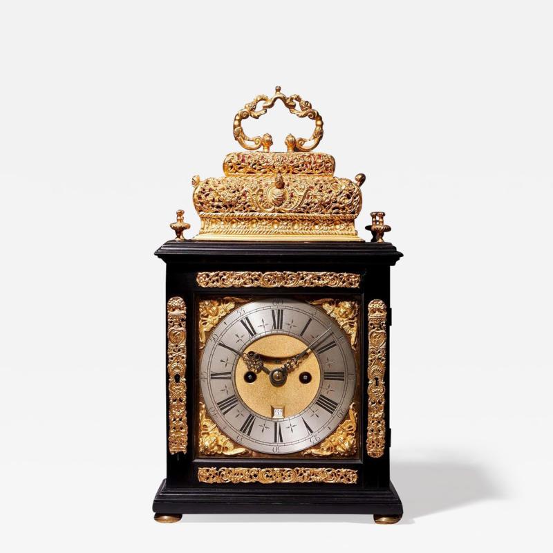 A 17th Century William and Mary eight day double basket table clock by Asselin