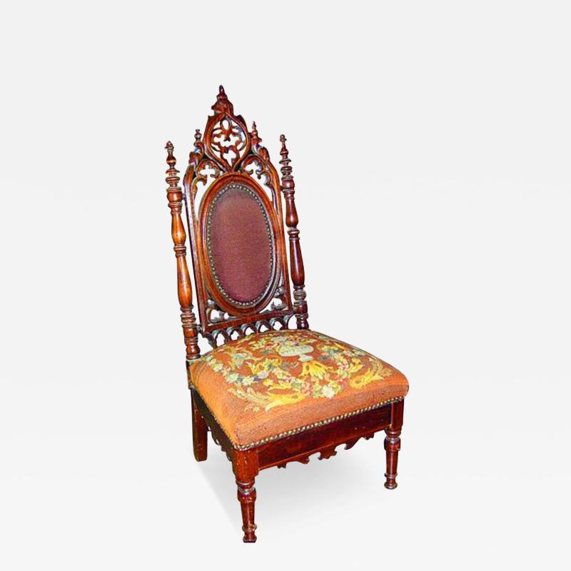 A 19th Century Anglo Indian Walnut and Caned Slipper Chair