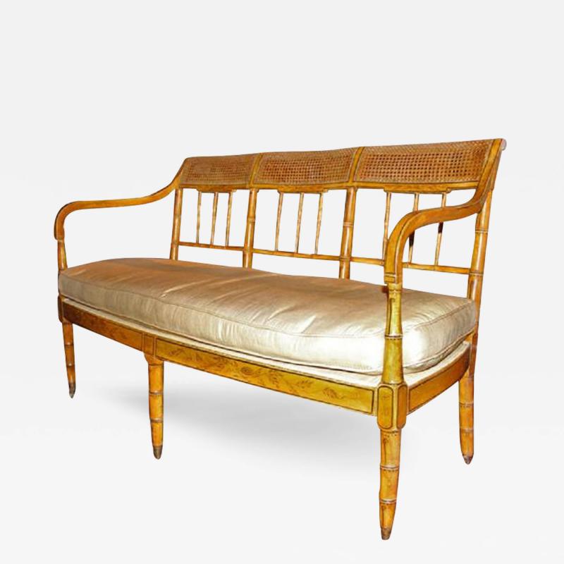 A 19th Century English Regency Caned Polychrome and Faux Bamboo Settee