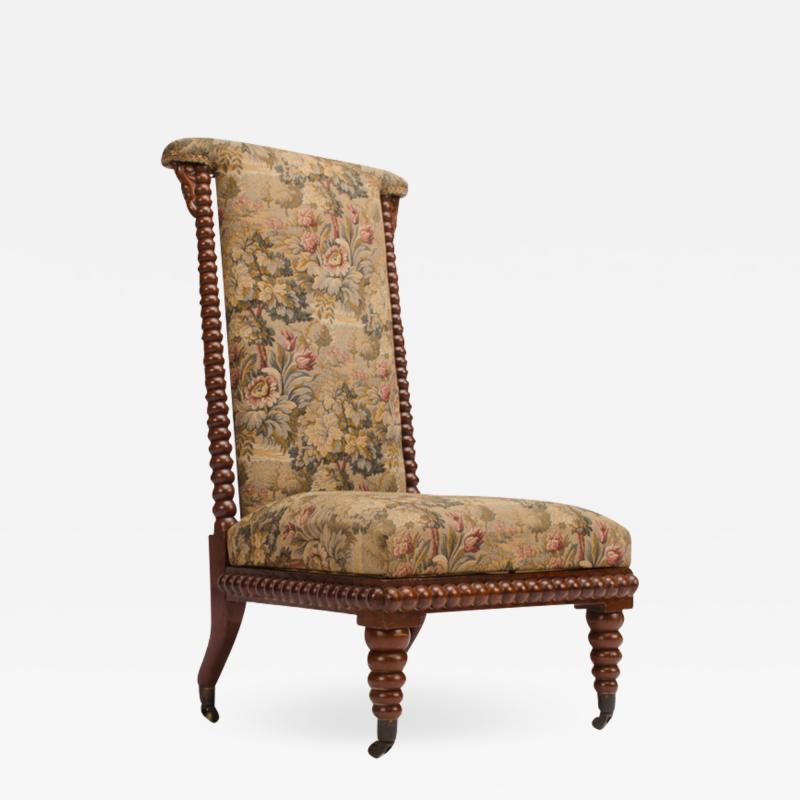 A 19th Century English spool chair mahogany with fabric upholstery