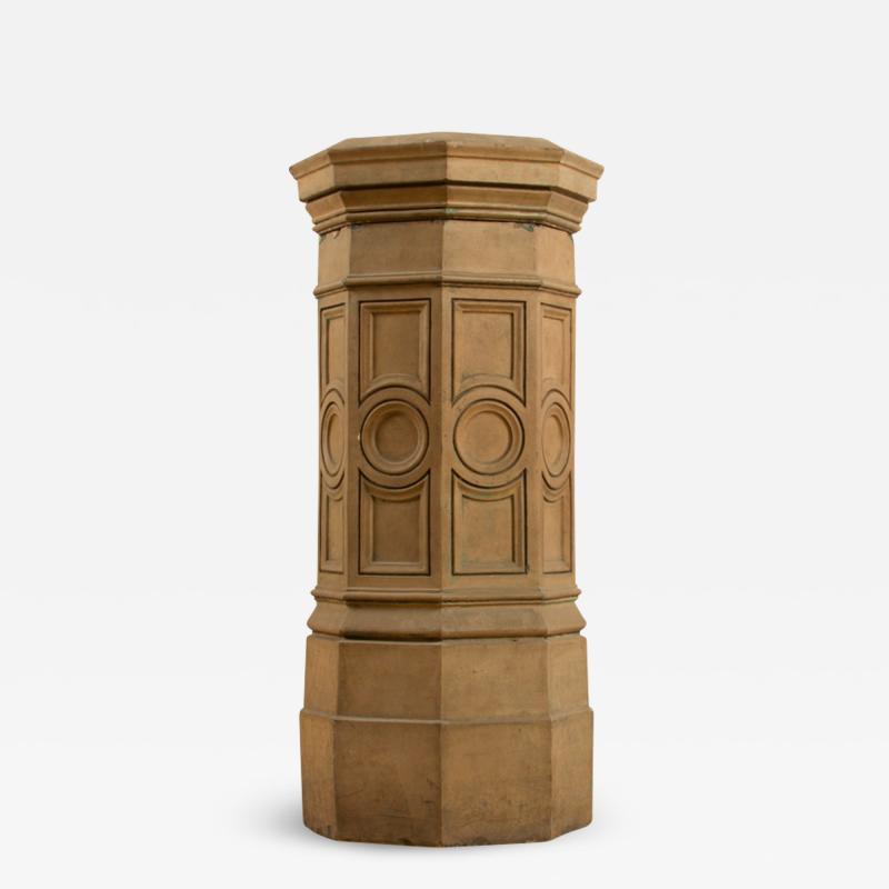 A 19th Century English terracotta pedestal circa 1860