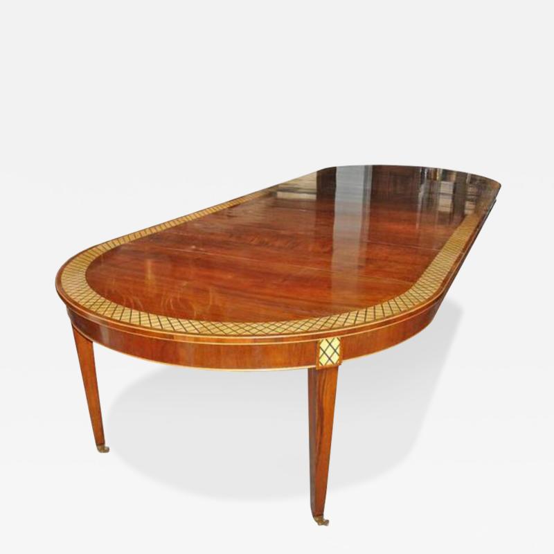 A 19th Century Neoclassical Mahogany Parquetry Dining Table