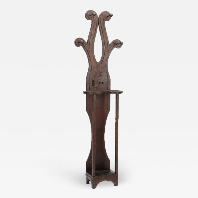 A 19th Century Tramp Art hall tree with pipe holder