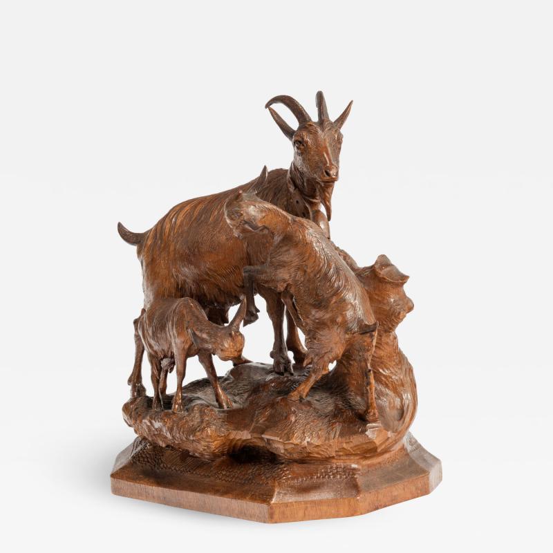 A Black Forest wood carving of a mountain goat