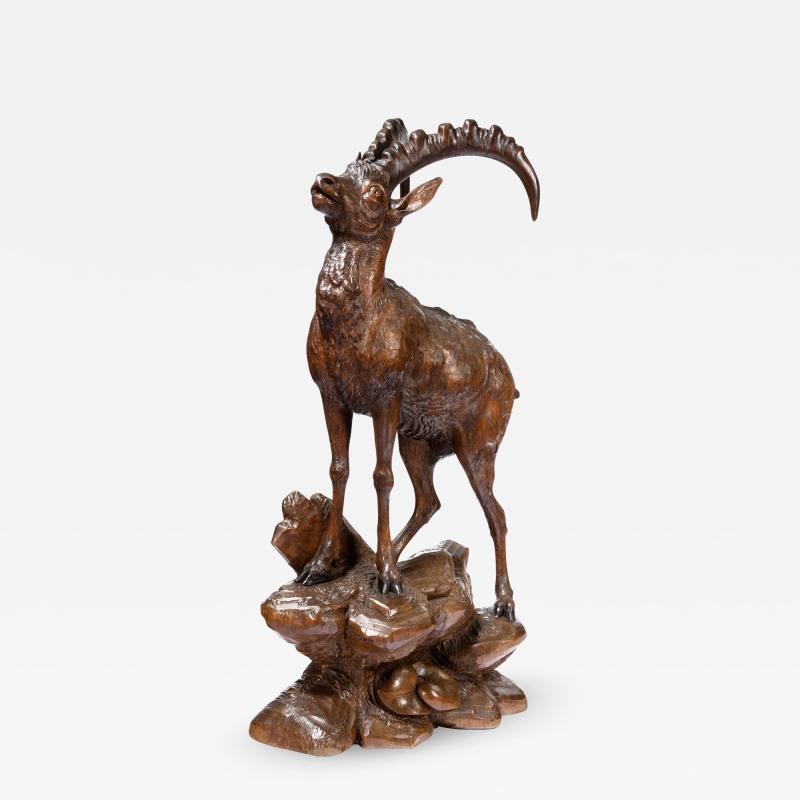 A Black Forest wood carving of an Ibex