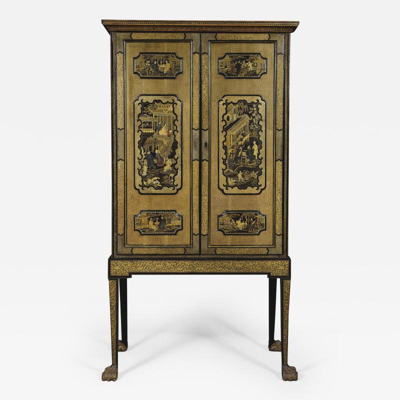 A Black Lacquer Polychrome And Two Color Gilt Cabinet On Original Stand