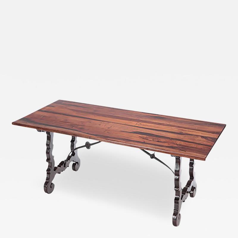 A Brazilian table with iron stretcher Circa 1940 