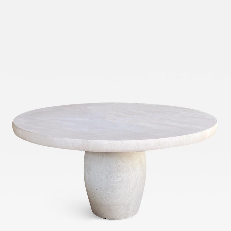 A Carved French Limestone Round Dining Center Table with Barrel form Base