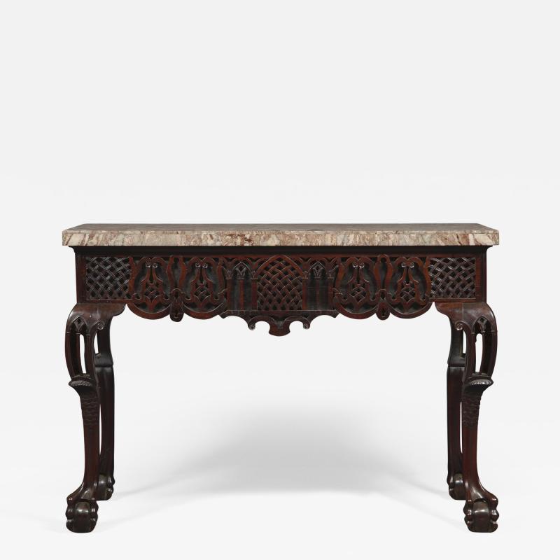 A Carved George II Cuban Mahogany Side Table Of Predominantly Gothic Taste