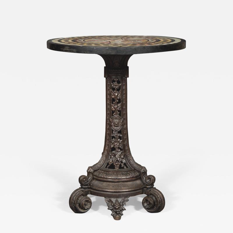 A Cast Iron Center Table With Specimen Marble Top Of Geometric Design