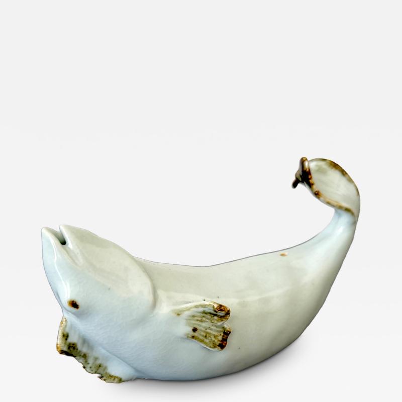 A Celadon Porcelain Figure of a Whale