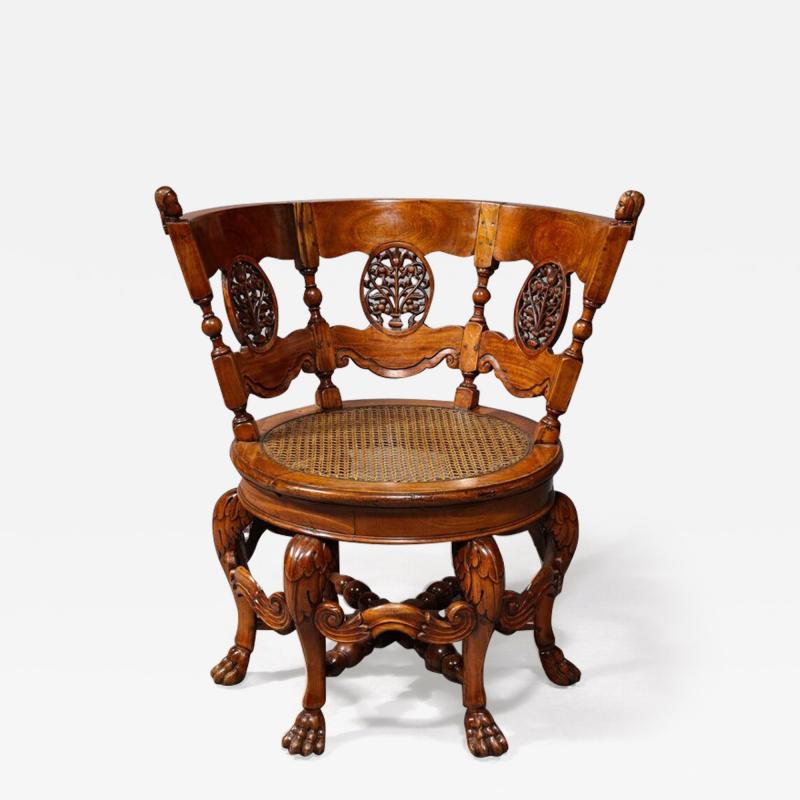 A Close Pair of 16th Century Dutch Colonial Swivel Chairs