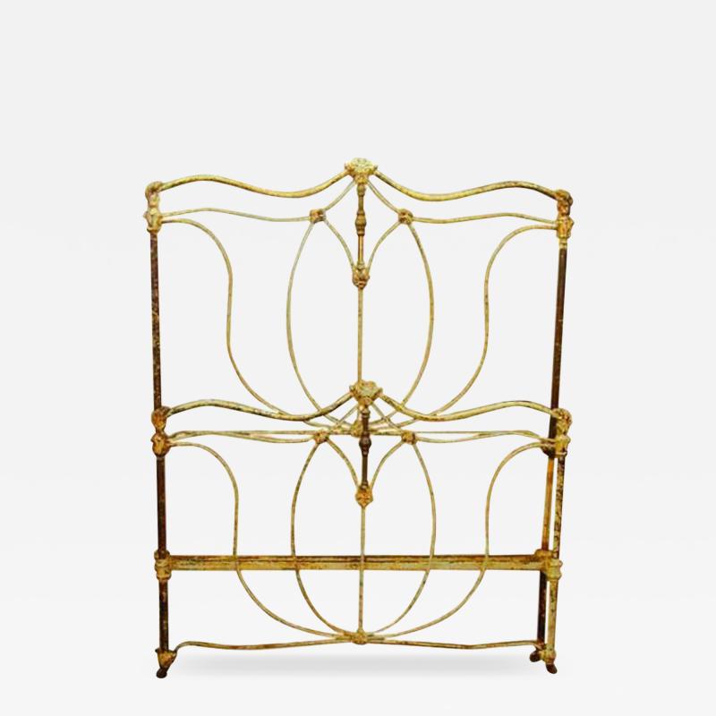 A Continental Wrought Iron and Brass Polychrome Bed