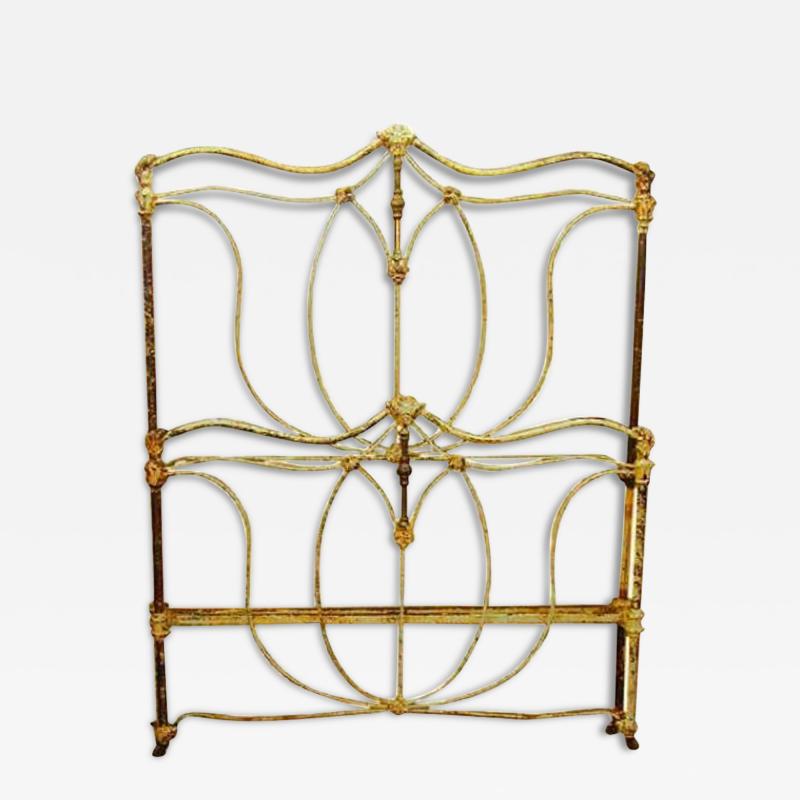 A Continental Wrought Iron and Brass Polychrome Bed