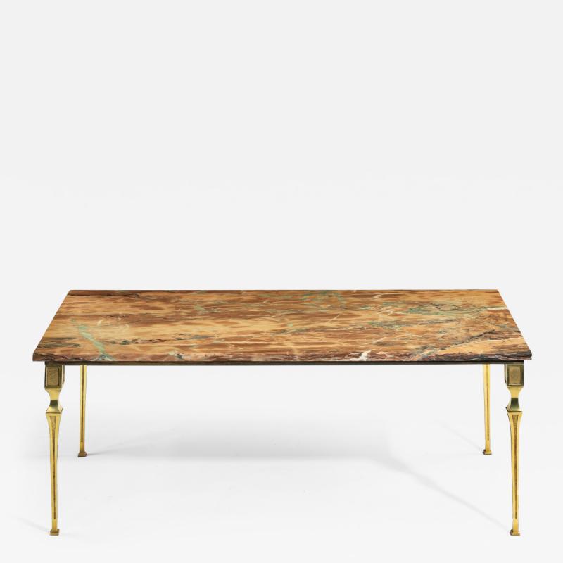 A Continental brass marble topped coffee table