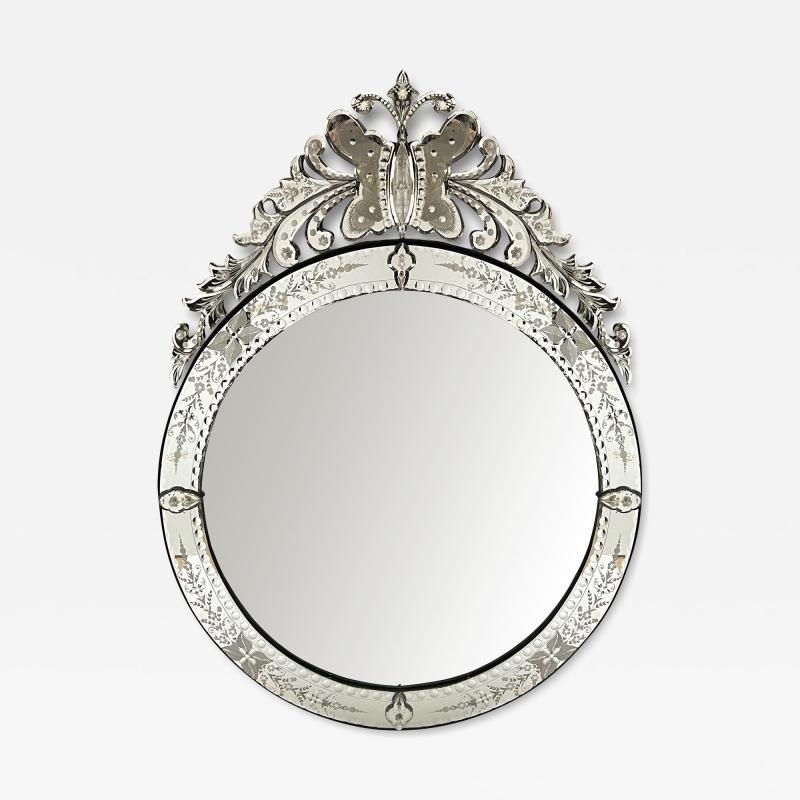 A Custom Venetian Style Circular Mirror with Ornate Butterfly and Floral Crest