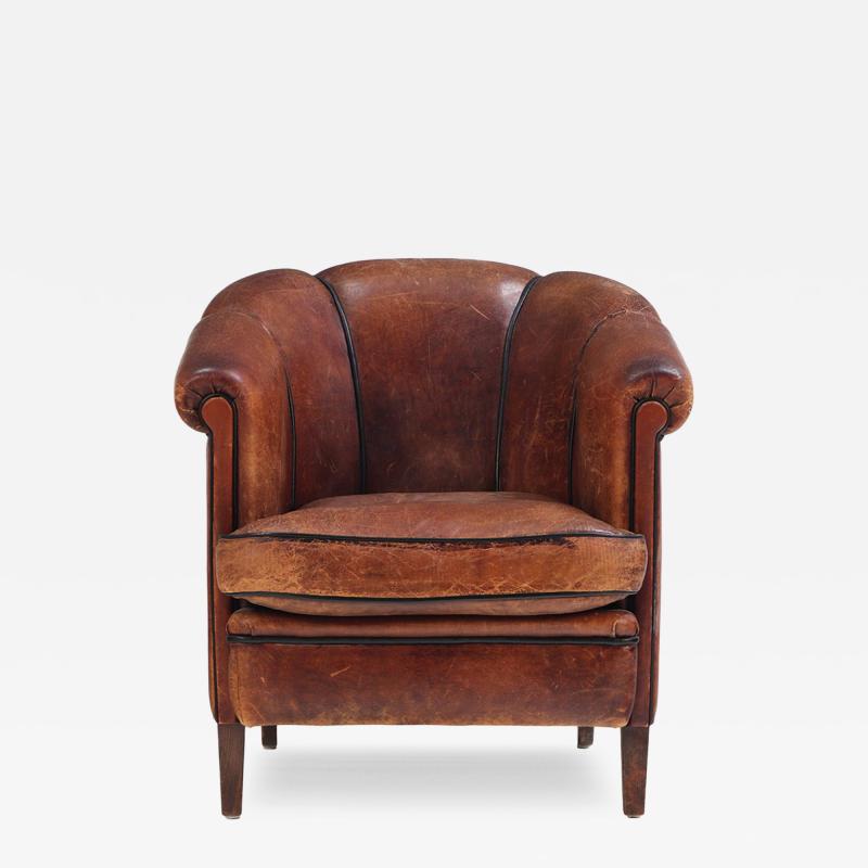 A Dutch Art Deco leather club chair C 1940 
