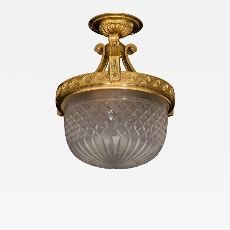 A EDWARDIAN ORMOLU MOUNTED CEILING LIGHT