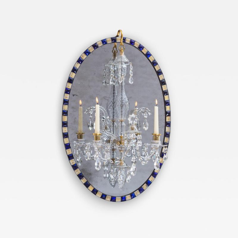 A FINE GEORGE III OVAL MIRROR CHANDELIER