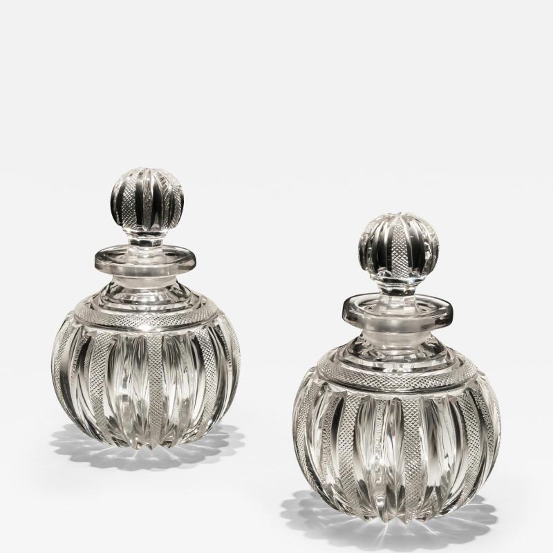 A FINE PAIR OF REGENCY PILLAR FILE CUT SCENT BOTTLES