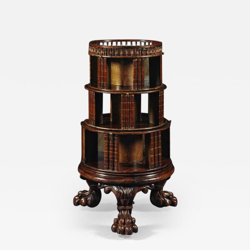 A FINE REGENCY ROSEWOOD WEDDING CAKE REVOLVING CIRCULAR BOOKCASE