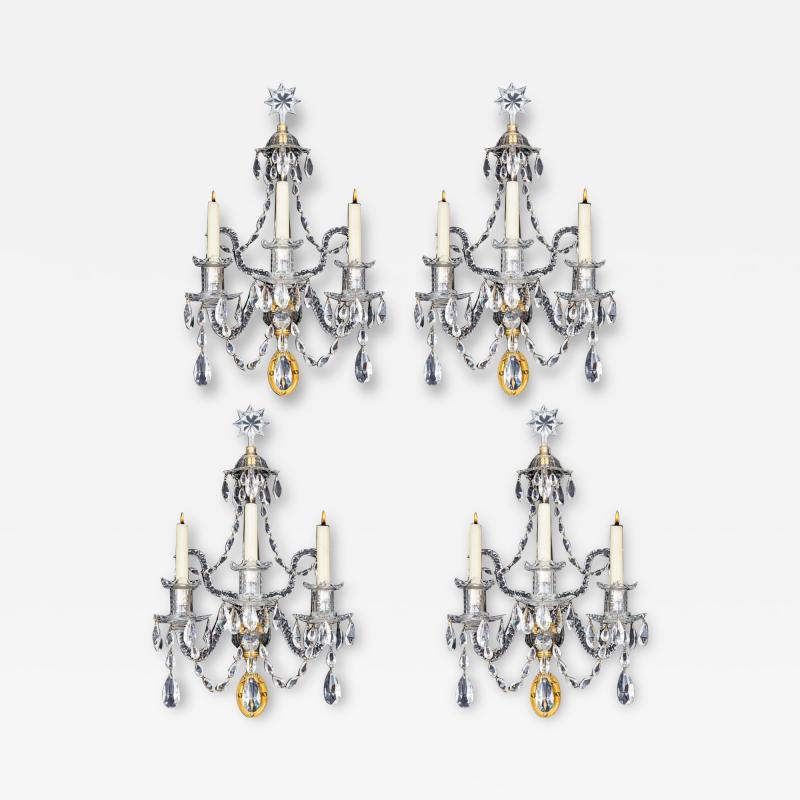 A FINE SET OF FOUR GEORGE III ORMOLU MOUNTED AND CUT GLASS WALL LIGHTS