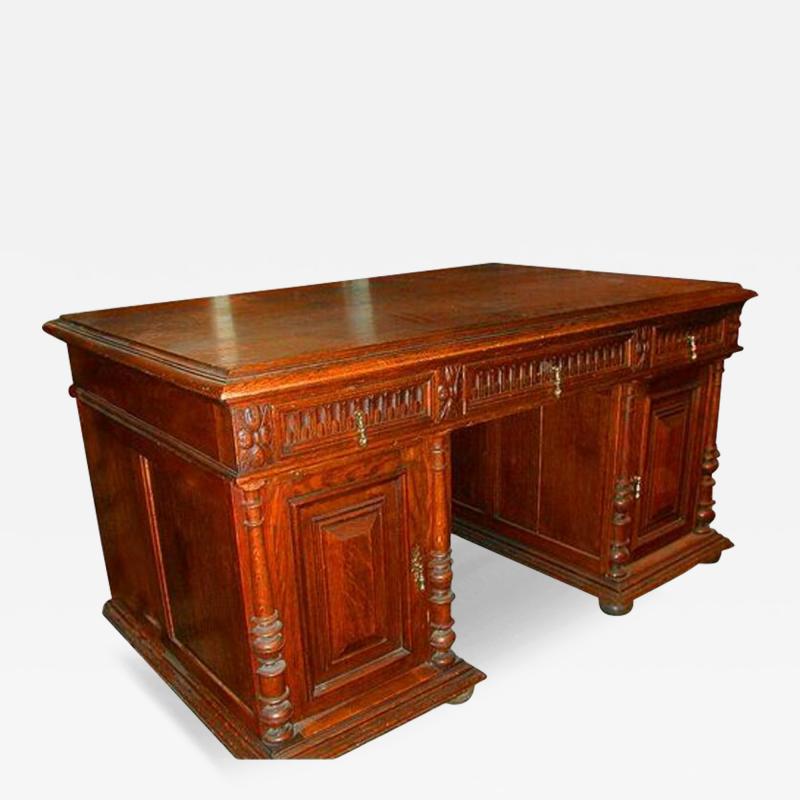 A Finely Carved 19th Century English Oak Partners Desk