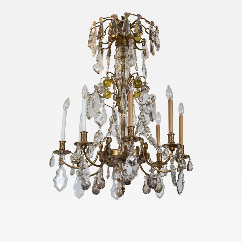 A Finely Cast Bronze and Crystal Eight Arm Chandelier
