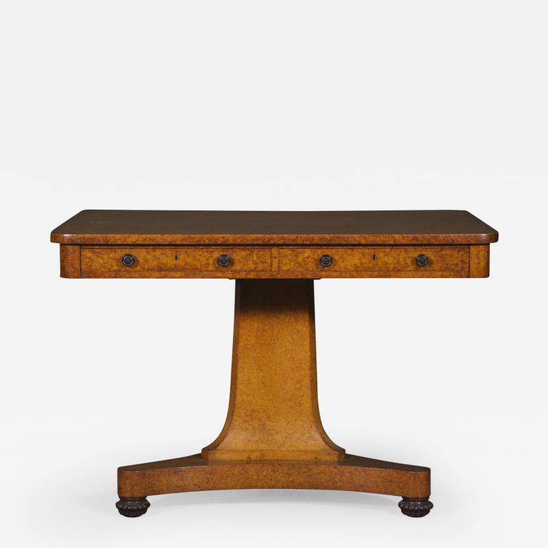 A Finely Figured Amboyna Late Regency Library Table