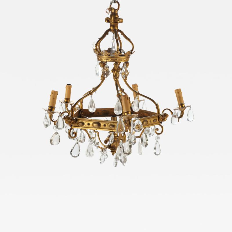 A French Antique 5 light bronze and crystal chandelier 
