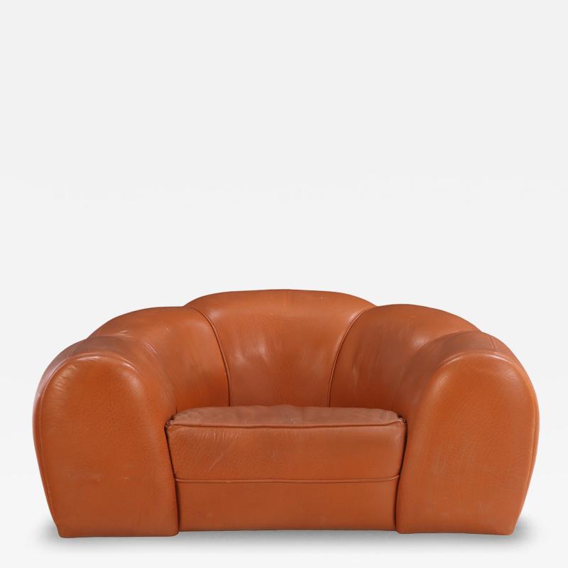 A French Bulbous Croissant shaped Leather Chair C 1985 