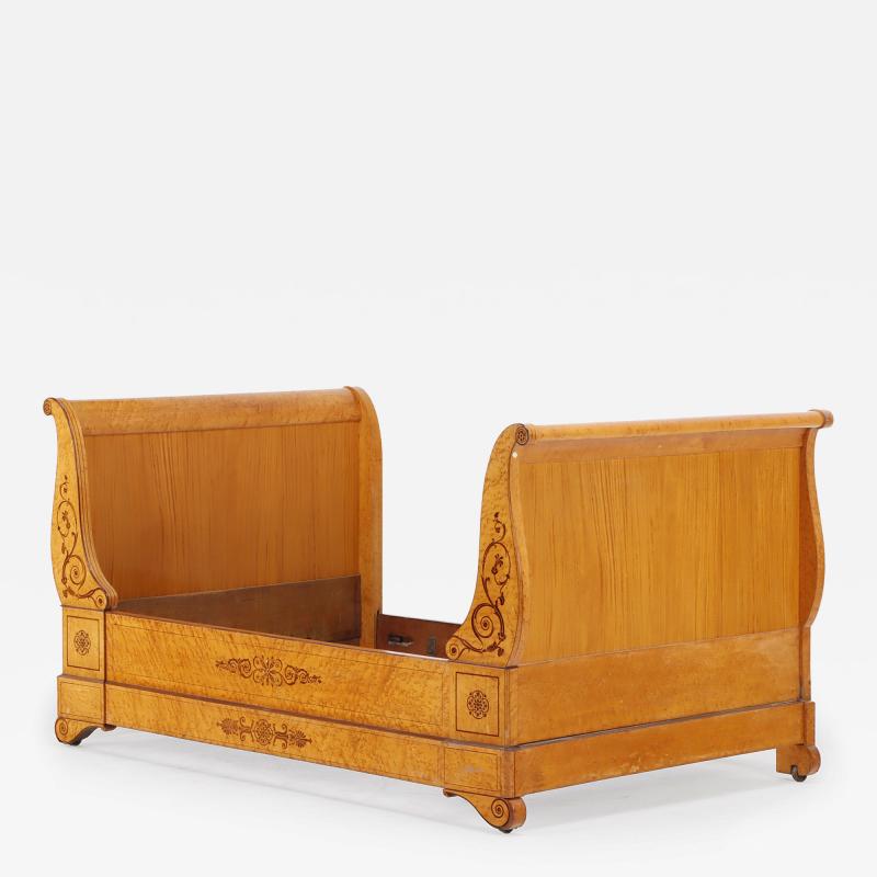 A French Charles X inlaid birdseye maple daybed C 1840 