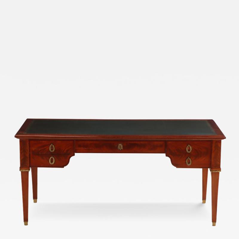 A French Louis XIV style mahogany and crotch mahogany leather top desk C 1900 